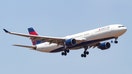 Delta Air Lines Airbus A330-300 landing at Athens International Airport AIA , LGAV / ATH Eleftherios Venizelos, with registration N806NW, a former Northwest Airlines Airplane. 