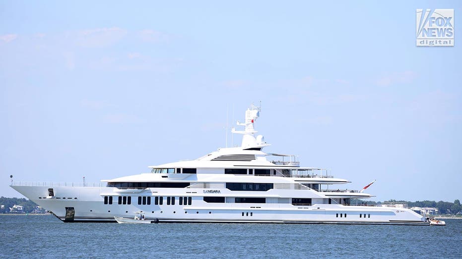 Massive white yacht owned by Harry Potter author, J.K. Rowling is moored in the middle of a harbor