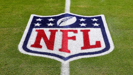 The NFL logo is seen on the field prior to a game between the Green Bay Packers and Miami Dolphins at Hard Rock Stadium on December 25, 2022 in Miami Gardens, Florida.