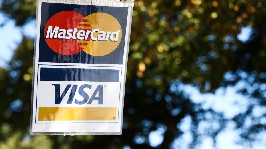 Visa and Mastercard sign